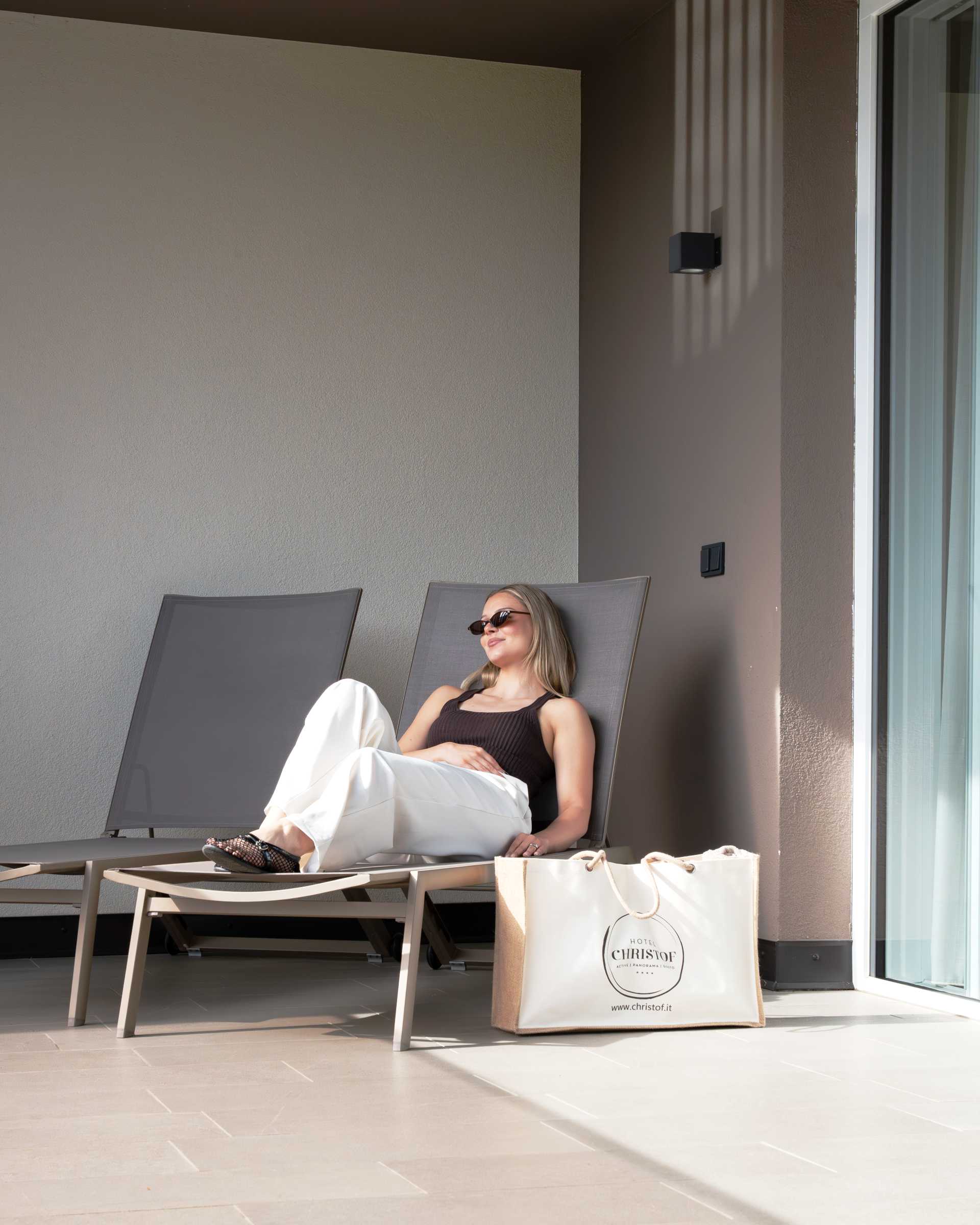 Woman relaxing on a lounger