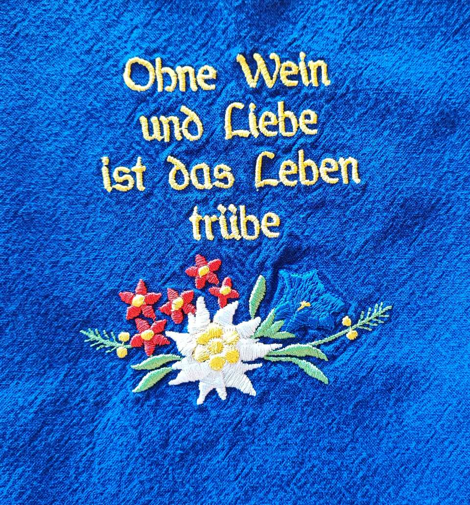 The saying on the blue traditional farm aprons