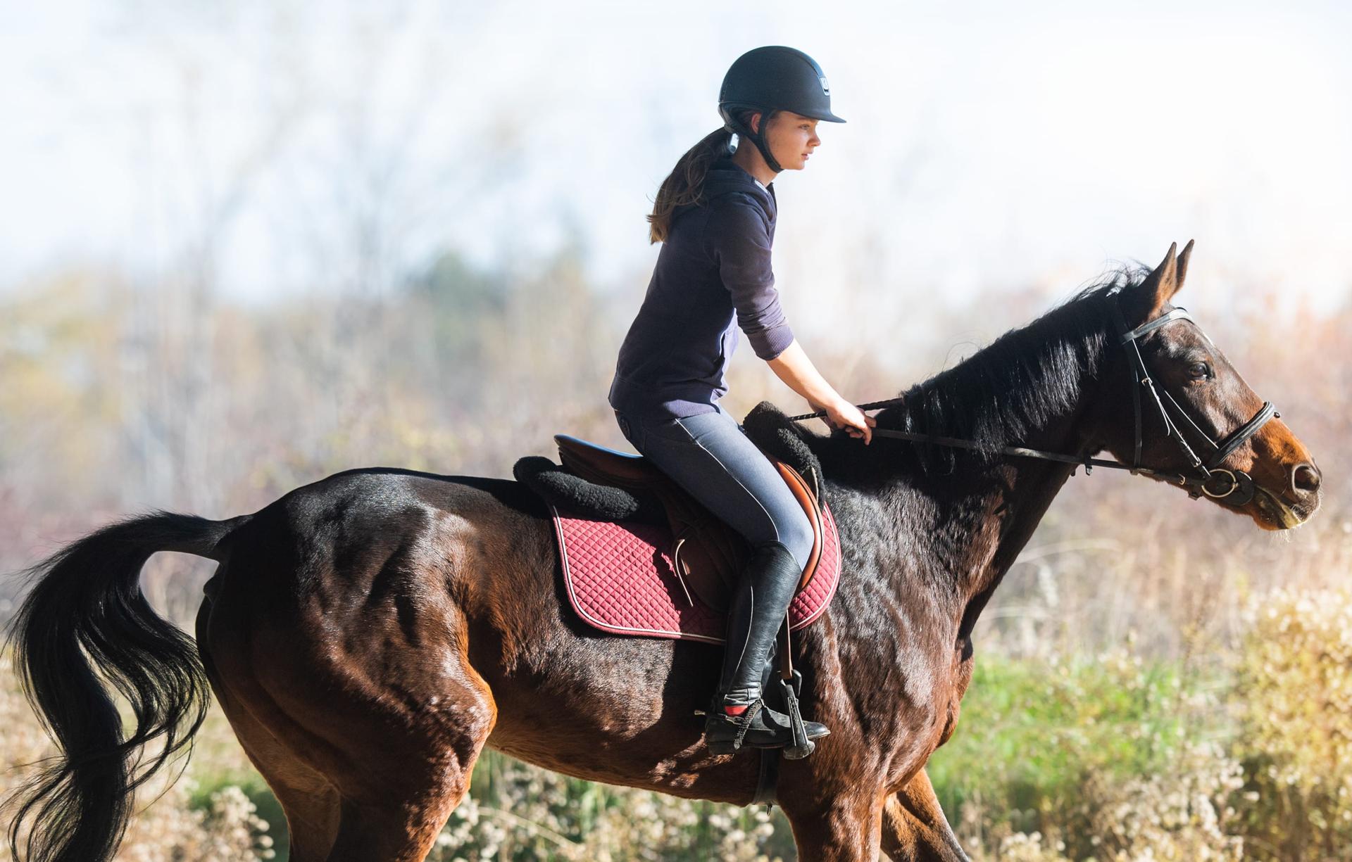 Woman riding a horse
